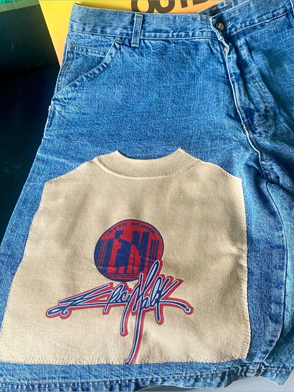 Vintage Eric Malik Tan Patch Graphic Denim Short. Made in an Italy.